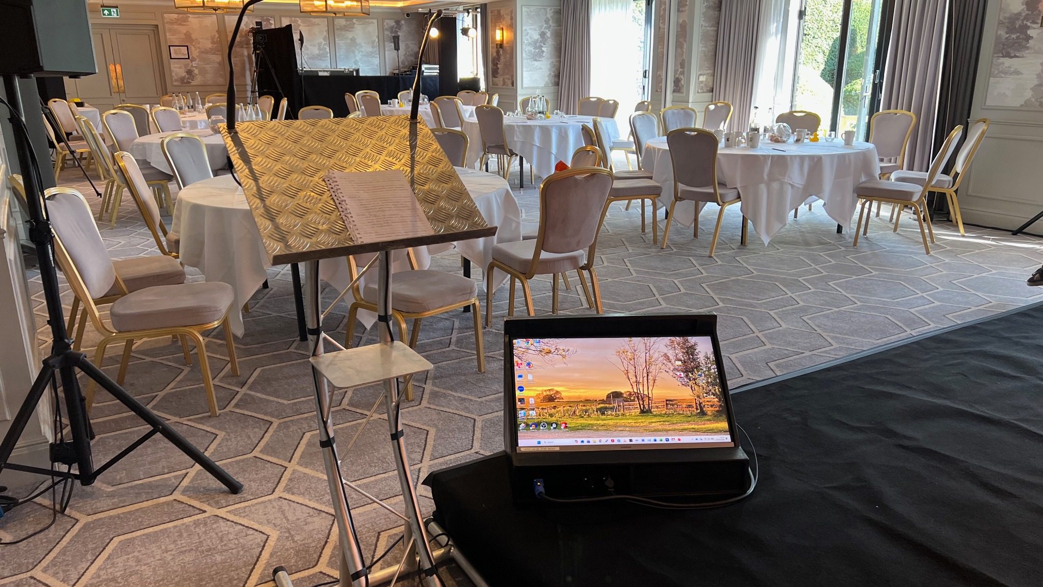 Lectern, confidence monitor and technical setup for an awards event